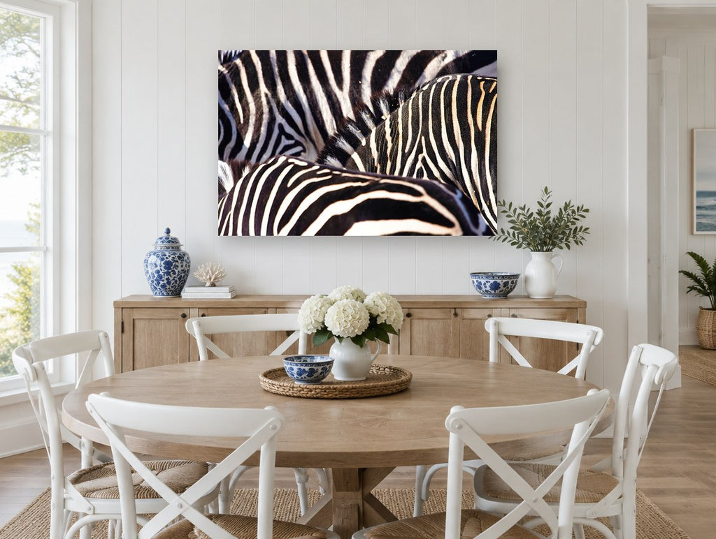 Zebra Stripe Huddle animal canvas print on the wall of a Hamptons dining room