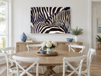 Zebra Stripe Huddle animal canvas print on the wall of a Hamptons dining room