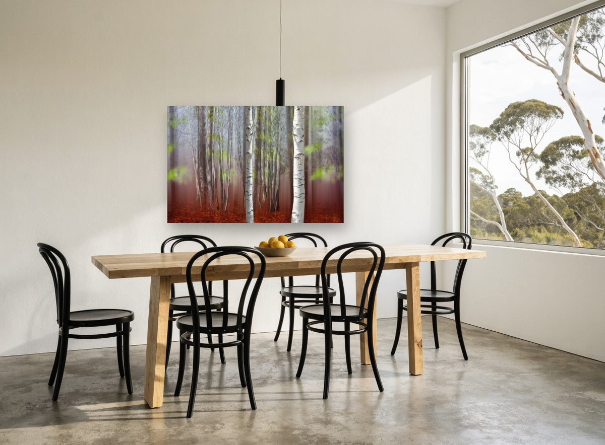 Two Birches in Rust landscape canvas print on the wall of a dining room
