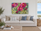 Crimson Garden Bloom floral canvas print on the wall of a beach house living room