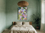 Iris Garden Gathering floral canvas print on the wall of a bedroom