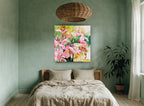 Pink Lily Bouquet floral canvas print on the wall of a bedroom