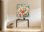 Pink Lily Cluster floral canvas print on the wall of a hallway