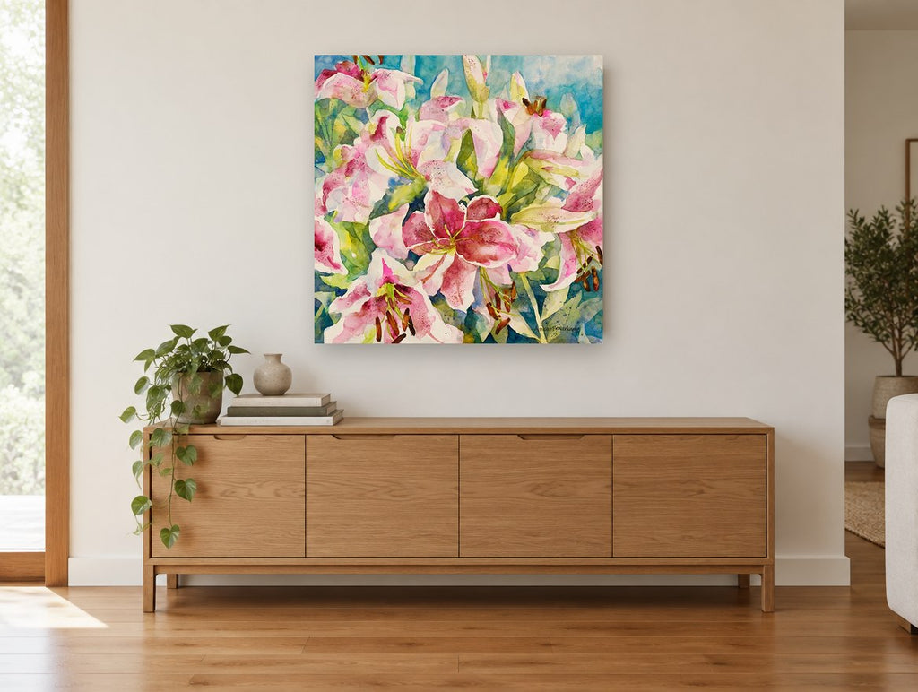 Pink Lily Cluster floral canvas print on the wall of a living room above a sideboard