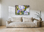 Lilac Iris Garden floral canvas print on the wall of a living room