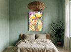 Sunlit Yellow Tulips floral canvas print on the wall of a bedroom