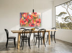 Poppy Field Glow floral canvas print on the wall of a dining room