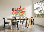 Poppy Glow floral canvas print on the wall of a dining room