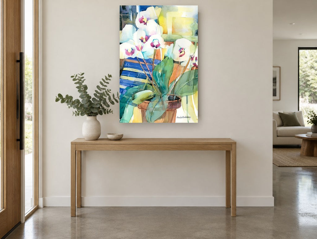White Orchids on Blue floral canvas print on the wall of a entry hall