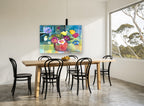 Pansies in Terracotta floral canvas print on the wall of a dining room