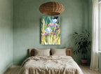 Sunlit Iris Garden floral canvas print on the wall of a bedroom