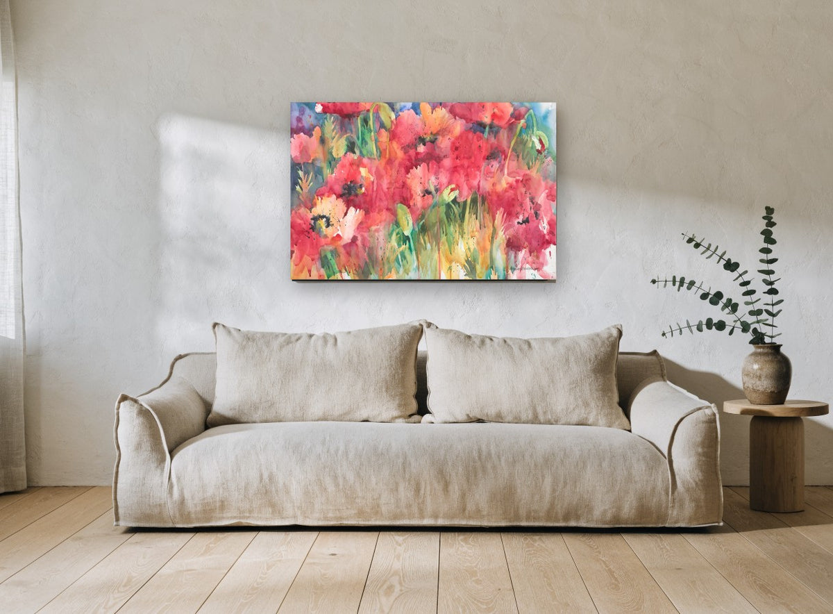 Poppy Field Bloom floral canvas print on the wall of a living room