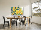 Daffodil Gathering floral canvas print on the wall of a dining room