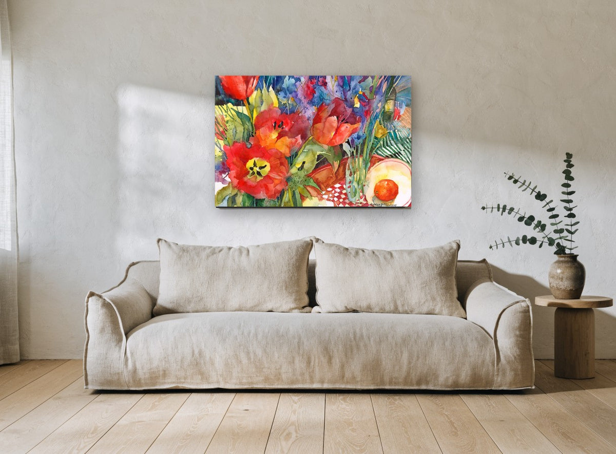 Tulips and Tangerine floral canvas print on the wall of a living room