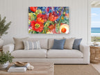 Tulips and Tangerine floral canvas print on the wall of a beach house living room