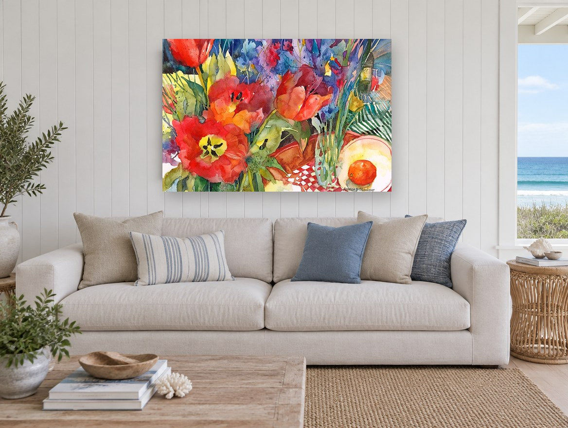 Tulips and Tangerine floral canvas print on the wall of a beach house living room