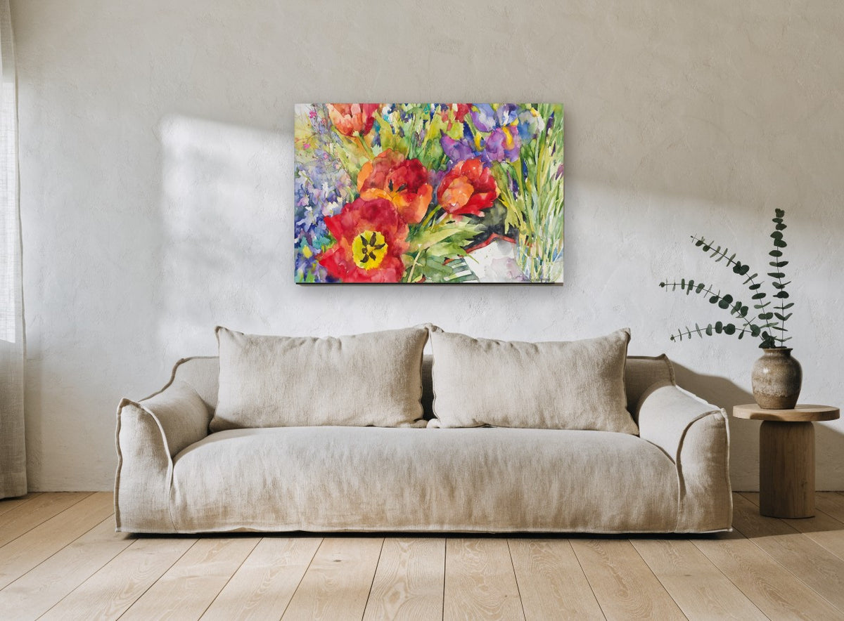 Red Tulips and Iris floral canvas print on the wall of a living room