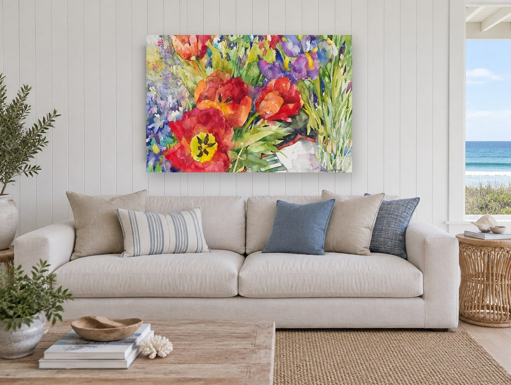 Red Tulips and Iris floral canvas print on the wall of a beach house living room