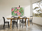 Pink Peony Garden floral canvas print on the wall of a dining room