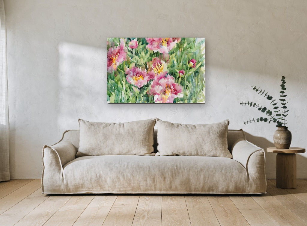 Pink Peony Garden floral canvas print on the wall of a living room