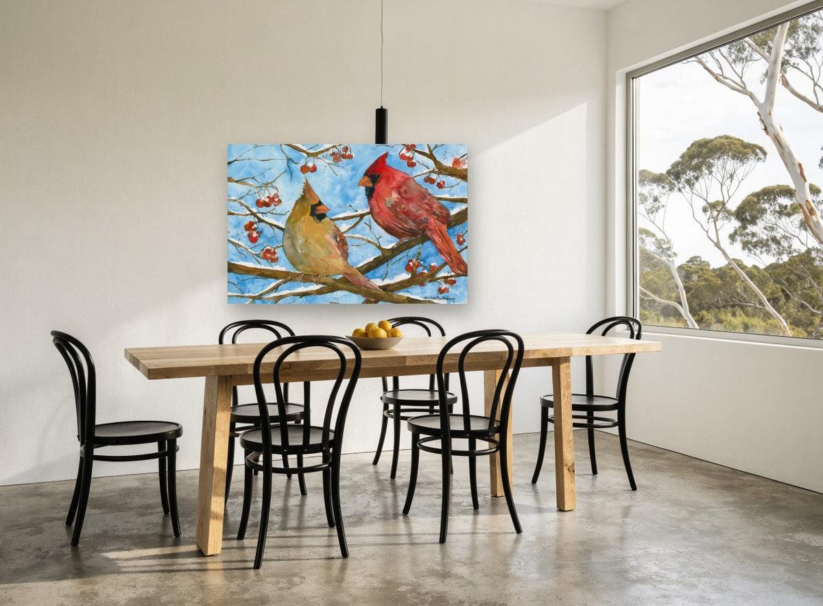 Cardinal Pair in Winter landscape canvas print on the wall of a dining room