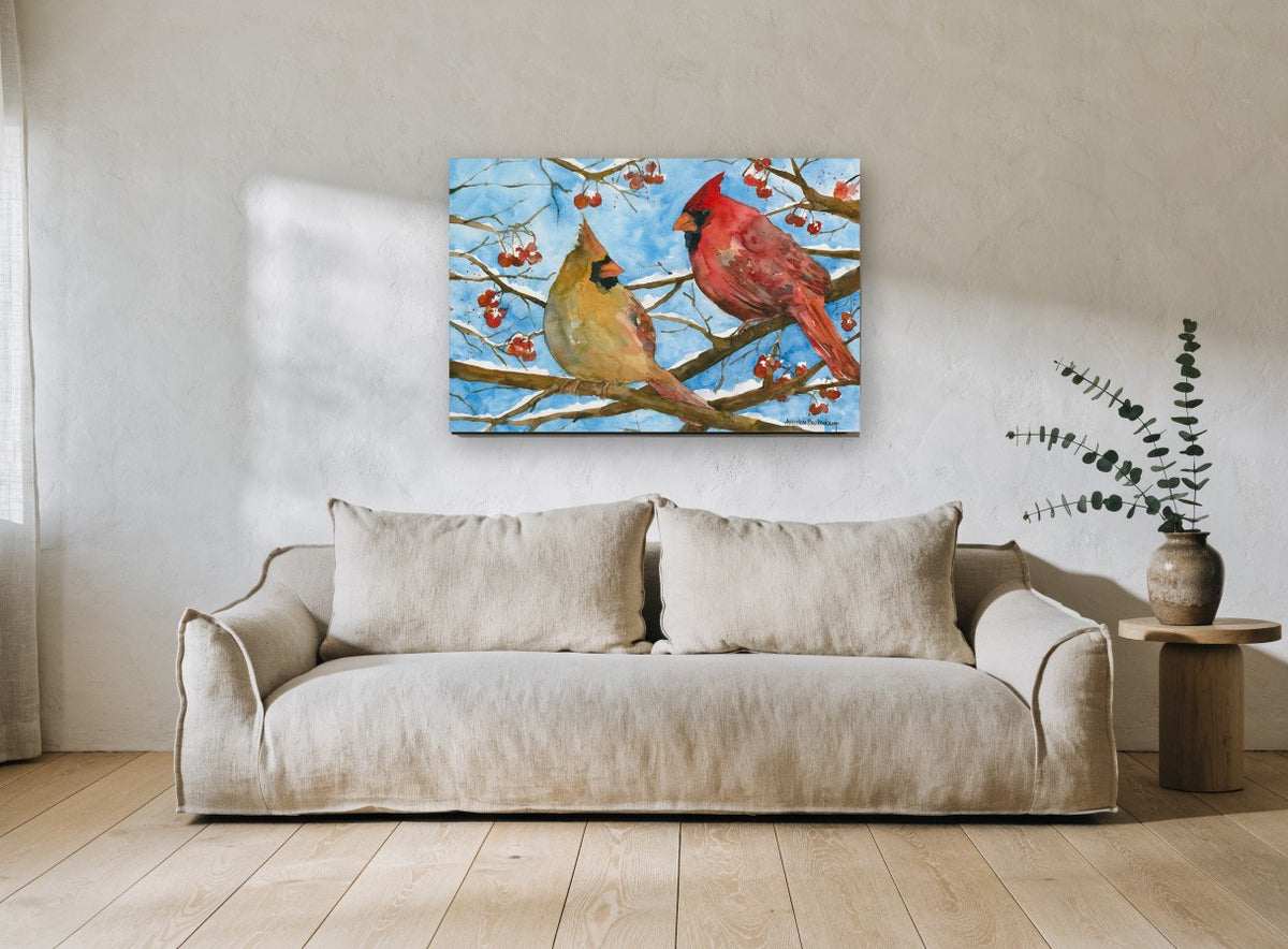 Cardinal Pair in Winter landscape canvas print on the wall of a living room