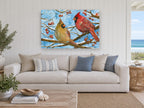Cardinal Pair in Winter landscape canvas print on the wall of a beach house living room