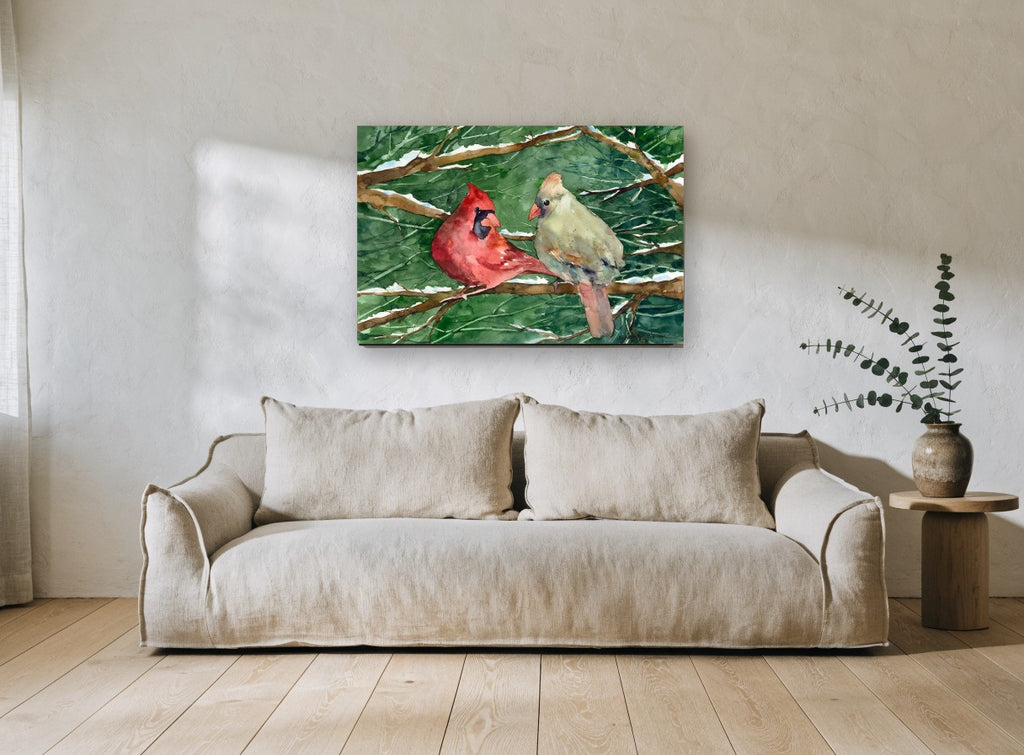 Cardinal Pair in Snow landscape canvas print on the wall of a living room