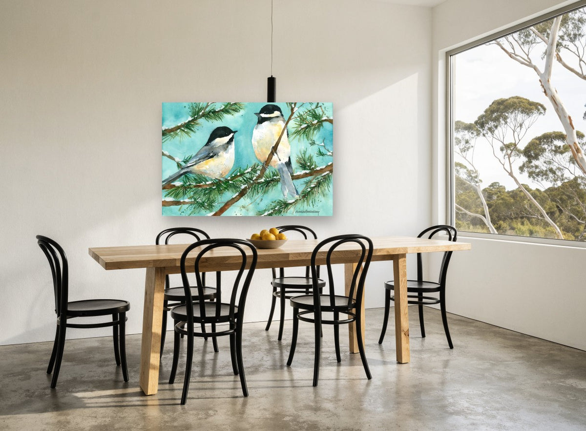 Two Chickadees in Snow landscape canvas print on the wall of a dining room