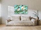 Two Chickadees in Snow landscape canvas print on the wall of a living room