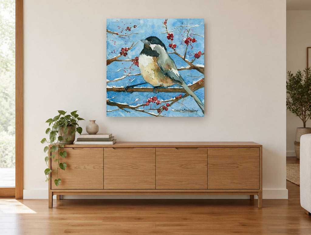 Chickadee on Snowy Branch animal canvas print on the wall of a living room above a sideboard