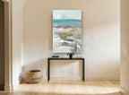 Dripping Teal Shoreline coastal canvas print on the wall of a hallway