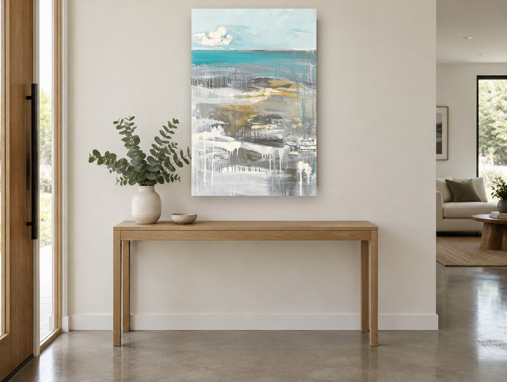 Dripping Teal Shoreline coastal canvas print on the wall of a entry hall