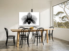 Orchid in Negative floral canvas print on the wall of a dining room