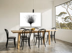 Rose in Silhouette floral canvas print on the wall of a dining room