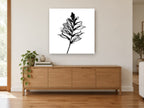 Foxglove Shadow Spire floral canvas print on the wall of a living room above a sideboard