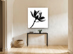 Magnolia in Silhouette floral canvas print on the wall of a hallway