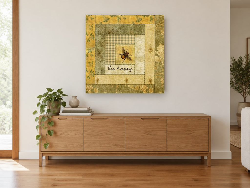 Bee Happy Patchwork animal canvas print on the wall of a living room above a sideboard
