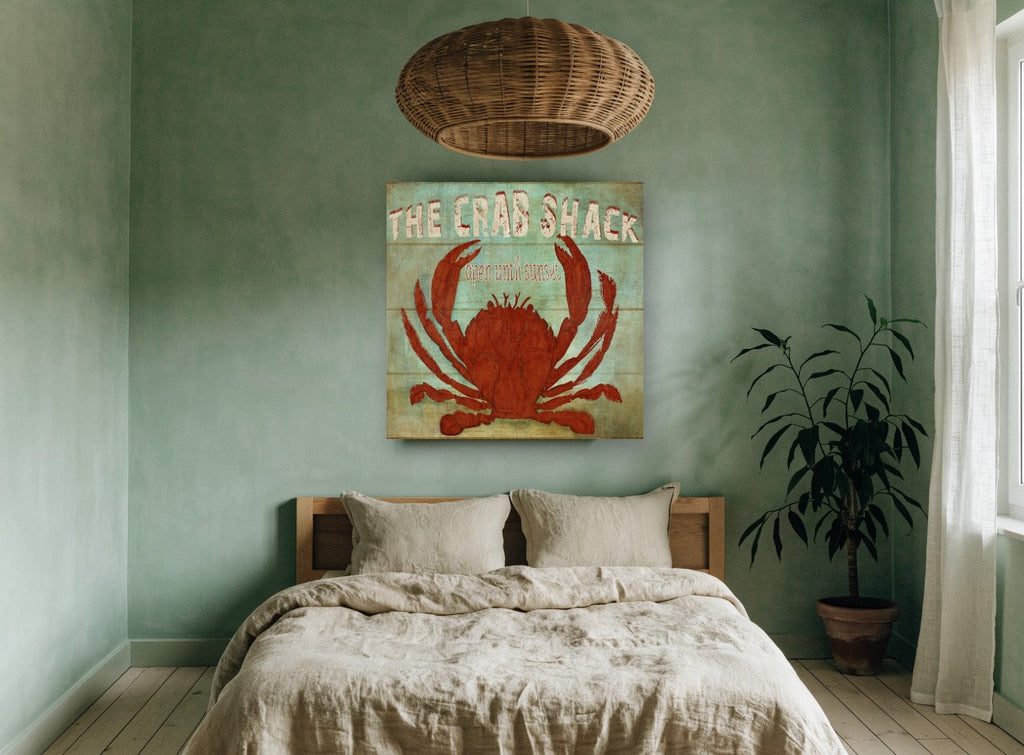 Red Crab Shack Sign coastal canvas print on the wall of a bedroom