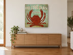 Red Crab Shack Sign coastal canvas print on the wall of a living room above a sideboard