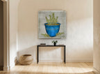 Blue Pot Rosemary vintage canvas print on the wall of a hallway