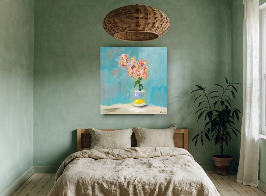Coral Blooms on Teal floral canvas print on the wall of a bedroom