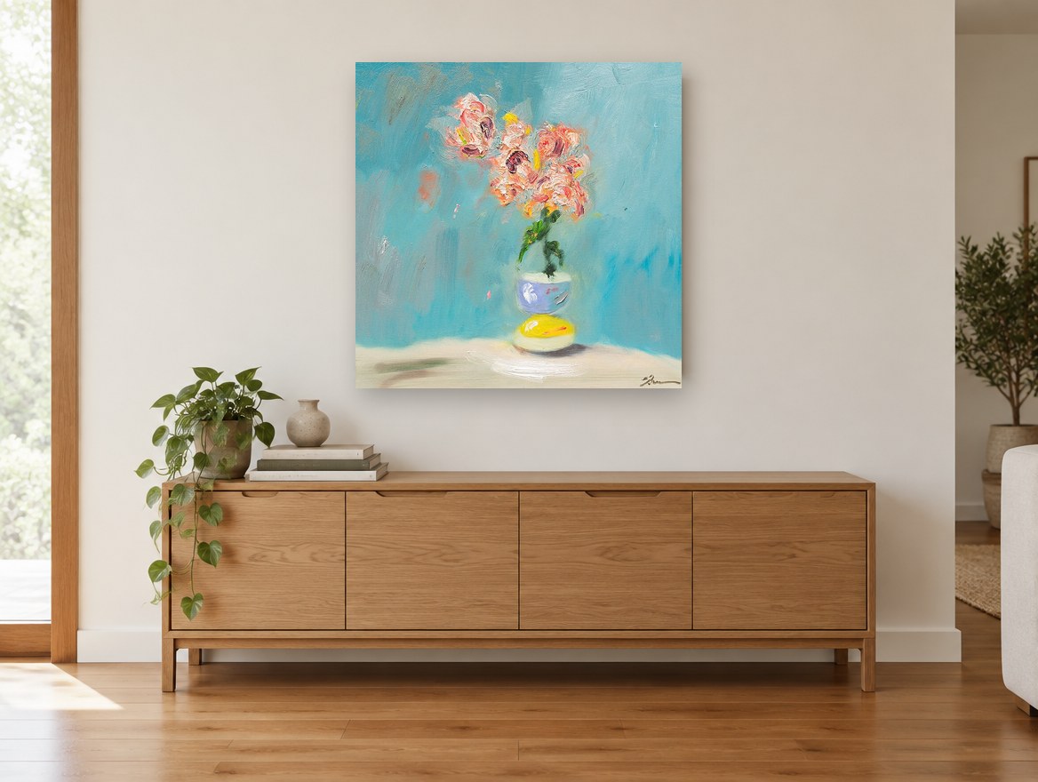 Coral Blooms on Teal floral canvas print on the wall of a living room above a sideboard