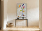 Loose Bouquet in Grey floral canvas print on the wall of a hallway