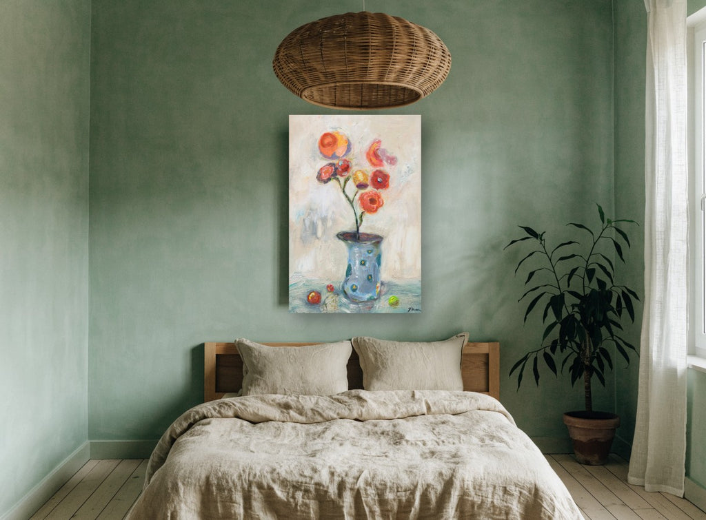 Coral Blooms in Blue Vase floral canvas print on the wall of a bedroom