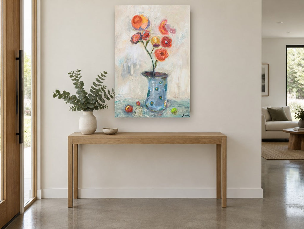 Coral Blooms in Blue Vase floral canvas print on the wall of a entry hall