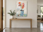 Coral Blooms in Blue Vase floral canvas print on the wall of a entry hall