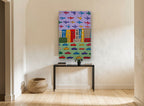 Busy City Skies kids canvas print on the wall of a hallway