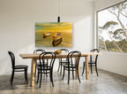 Twin Dinghies at Dusk coastal canvas print on the wall of a dining room