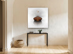 Gull Above Still Boat coastal canvas print on the wall of a hallway